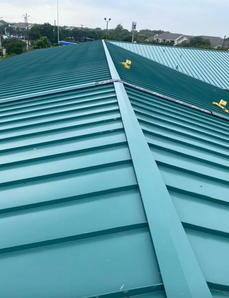 Green commercial metal roof ridge and valley for Metal Roof Repair in McLendon-Chisholm